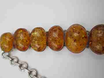 Women's articulated bracelet. Sterling silver & amber. Toggle clasp. 1980's