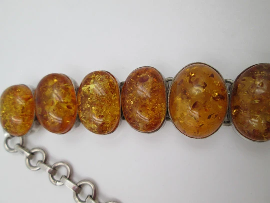 Women's articulated bracelet. Sterling silver & amber. Toggle clasp. 1980's