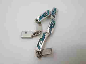 Women's articulated bracelet. Sterling silver and turquoise. Tab clasp. 1980's. Mexico