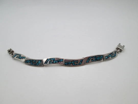 Women's articulated bracelet. Sterling silver and turquoise. Tab clasp. 1980's. Mexico