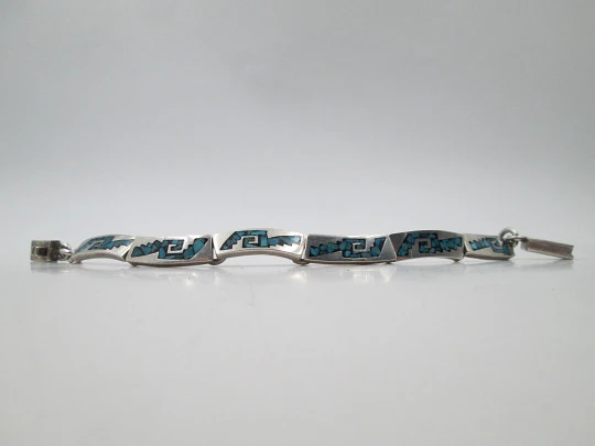 Women's articulated bracelet. Sterling silver and turquoise. Tab clasp. 1980's. Mexico