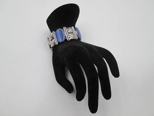 Women's articulated bracelet. Sterling silver & lapis lazuli. Floral motifs. 1980's