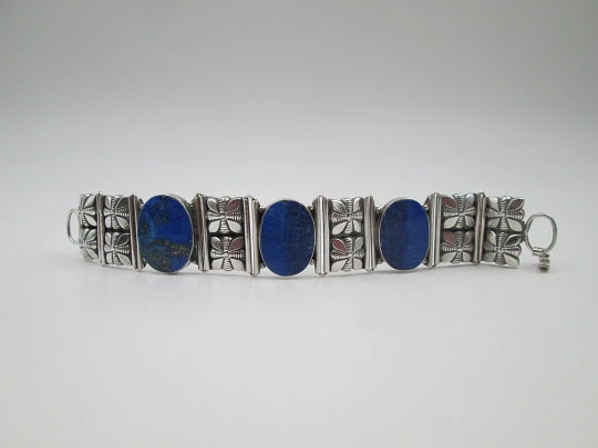 Women's articulated bracelet. Sterling silver & lapis lazuli. Floral motifs. 1980's