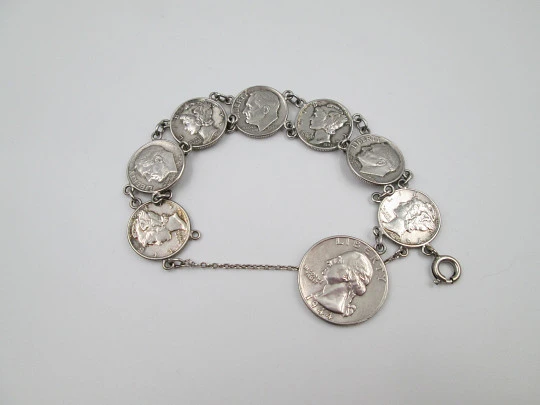 Women's articulated bracelet. US dollar cent coins. Sterling silver. Ring clasp. 1940's