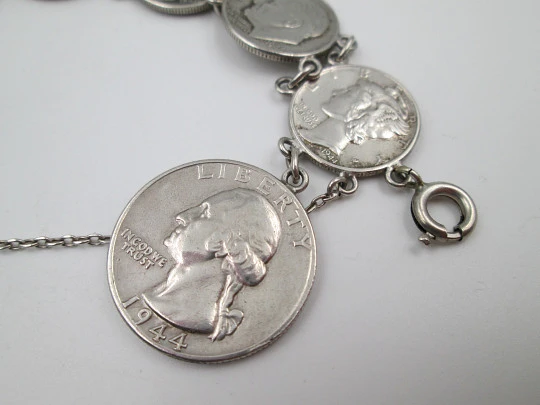 Women's articulated bracelet. US dollar cent coins. Sterling silver. Ring clasp. 1940's