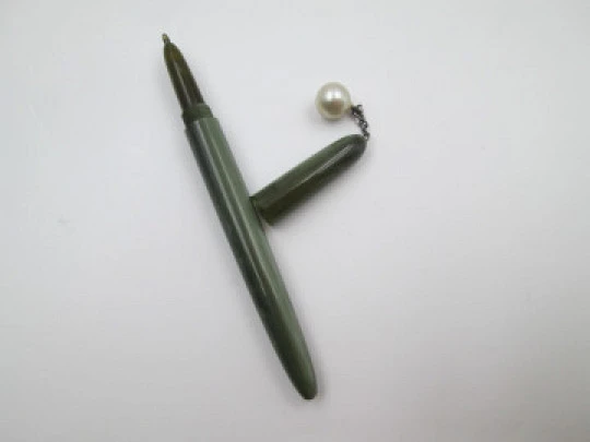 Women's ballpoint pen. Green marble plastic. Pearl ornament on top. Europe. 1950's