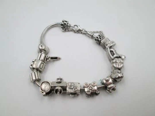 Women's bracelet. 925 sterling silver. 13 charms. 1990's. Various motifs