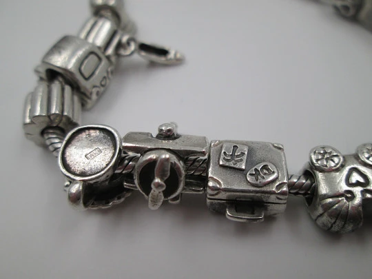 Women's bracelet. 925 sterling silver. 13 charms. 1990's. Various motifs