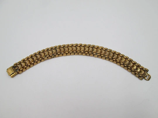 Women's bracelet. Gold plated metal. Articulated design. Safety box clasp. 1940's Women's bracelet. Gold plated metal. Articulated design. Safety box clasp. 1940's