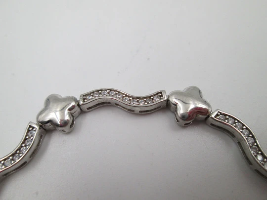 Women's bracelet. Sterling silver. Stars motifs and white stones. Ring clasp. 1990's. Europe