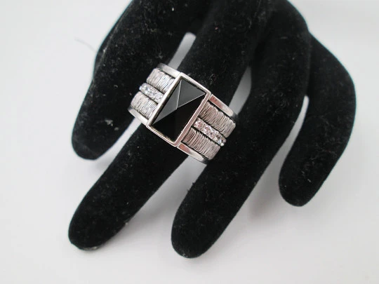 Women's broad ring. Sterling silver. Black stone and white gems trim. Europe. 1990's Women's broad ring. Sterling silver. Black stone and white gems trim. Europe. 1990's