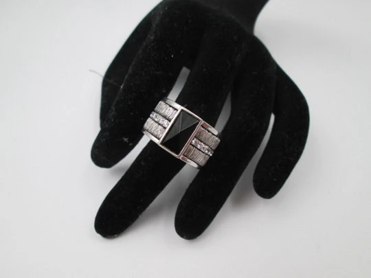 Women's broad ring. Sterling silver. Black stone and white gems trim. Europe. 1990's Women's broad ring. Sterling silver. Black stone and white gems trim. Europe. 1990's