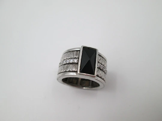 Women's broad ring. Sterling silver. Black stone and white gems trim. Europe. 1990's Women's broad ring. Sterling silver. Black stone and white gems trim. Europe. 1990's