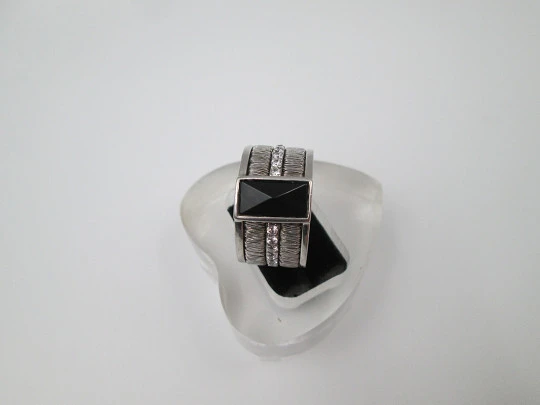 Women's broad ring. Sterling silver. Black stone and white gems trim. Europe. 1990's Women's broad ring. Sterling silver. Black stone and white gems trim. Europe. 1990's