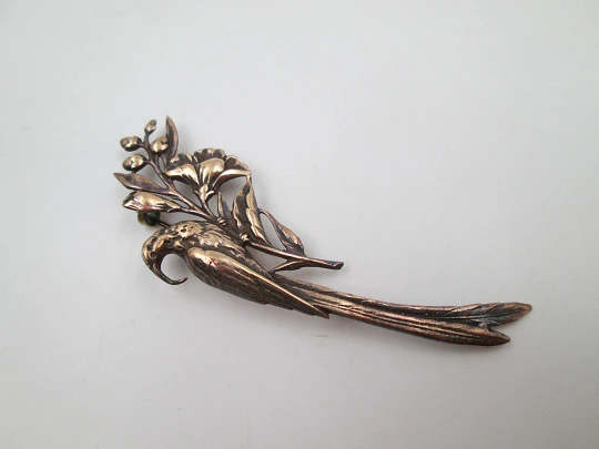 Women's brooch. Peacock on branch with flowers. Vermeil sterling silver. Europe. 1950's