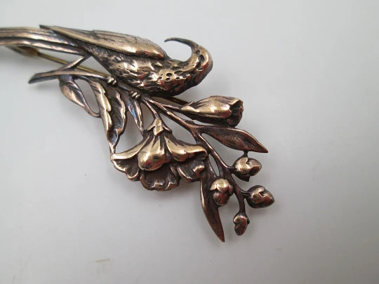Women's brooch. Peacock on branch with flowers. Vermeil sterling silver. Europe. 1950's