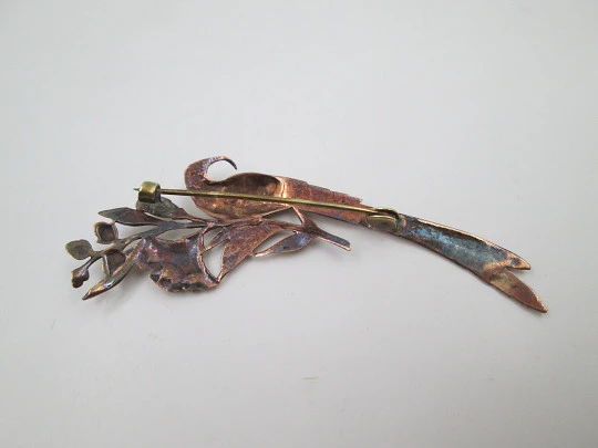 Women's brooch. Peacock on branch with flowers. Vermeil sterling silver. Europe. 1950's