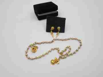 Women's choker and earrings set. Gold plated metal and white stones. Box