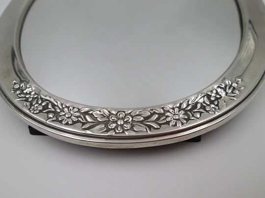 Women's dressing table mirror. Sterling silver and resin. Floral motifs. Spain. 1990's