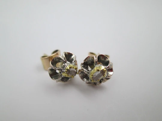 Women's earrings. 18 karat yellow gold and diamond rosettes. 1940's