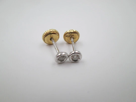 Women's earrings. 18k yellow and white gold. Diamonds brilliant cut. 1990's