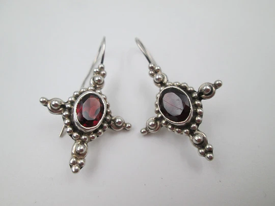Women's earrings. 925 sterling silver and garnet stones. Hook clasp. Europe. 1980's