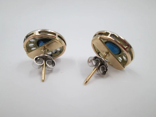 Women's earrings. Diamonds and sapphires. 1940's. 18k bitone gold