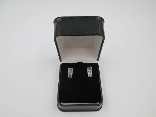 Women's earrings. Emeralds & diamonds. 18 karat white and yellow gold. 2010's