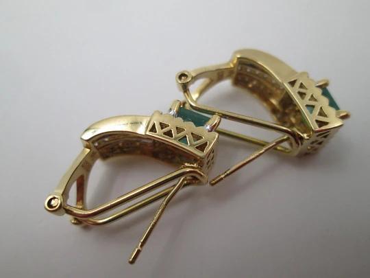 Women's earrings. Emeralds & diamonds. 18 karat white and yellow gold. 2010's