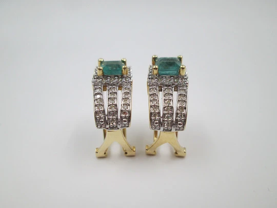 Women's earrings. Emeralds & diamonds. 18 karat white and yellow gold. 2010's