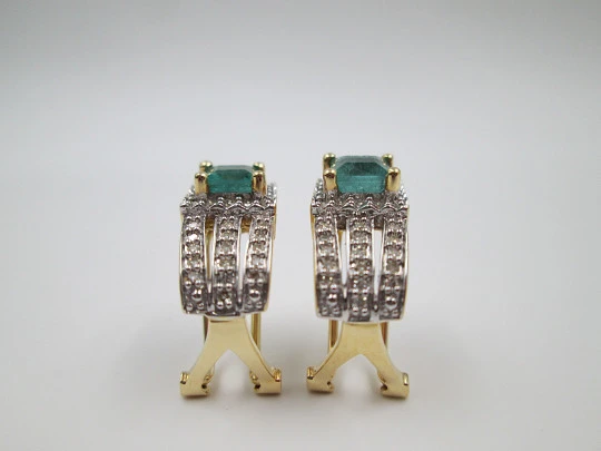 Women's earrings. Emeralds & diamonds. 18 karat white and yellow gold. 2010's