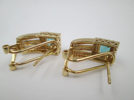 Women's earrings. Emeralds & diamonds. 18 karat white and yellow gold. 2010's