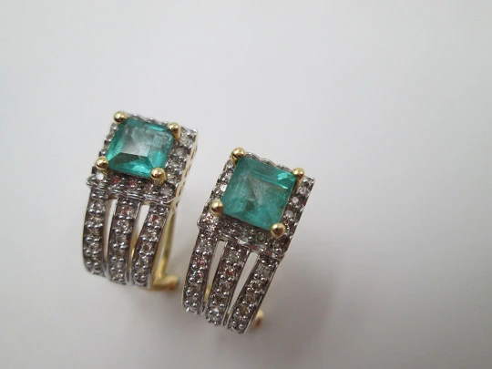 Women's earrings. Emeralds & diamonds. 18 karat white and yellow gold. 2010's