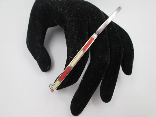 Women's half round bangle. Sterling silver and colours enamel. Tab clasp. Europe. 1990's