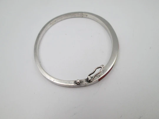 Women's half round bangle. Sterling silver and colours enamel. Tab clasp. Europe. 1990's