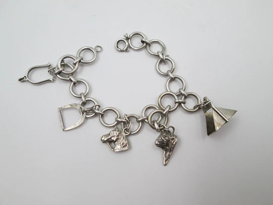 Women's hoops bracelet. Sterling silver. Equestrian pendants. 1960's