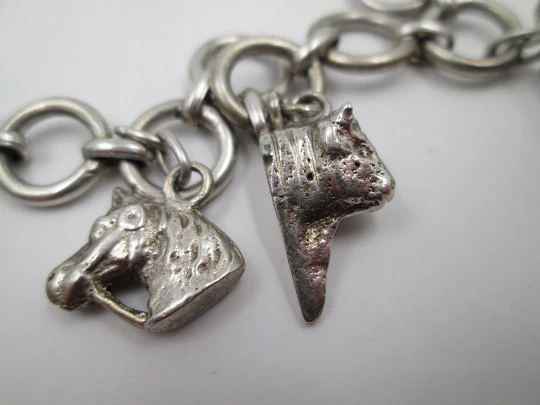 Women's hoops bracelet. Sterling silver. Equestrian pendants. 1960's