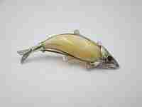 Women's jumping fish brooch. Sterling silver and ivory. 1940's. Europe