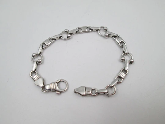 Women's links bracelet. 925 sterling silver. Hoops and balls motifs. Europe. 1990's