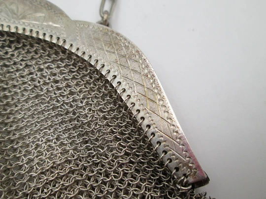 Women's mesh bag with chain. Chiseled clutch frame and fringed ends. Sterling silver. Europe