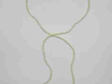 Women's necklace. Ivory beads & citrine ends. White gold rings. 1950's