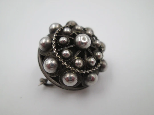 Women's openwork brooch. Charro button shape. 925 sterling silver. 1990's. Spain