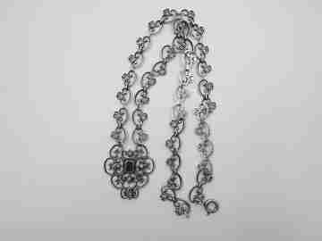 Women's openwork necklace. Sterling silver. Blue stone & white gems pendant