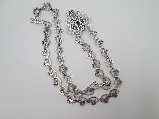 Women's openwork necklace. Sterling silver. Blue stone & white gems pendant