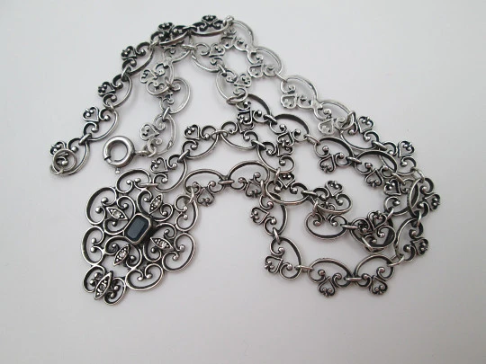 Women's openwork necklace. Sterling silver. Blue stone & white gems pendant