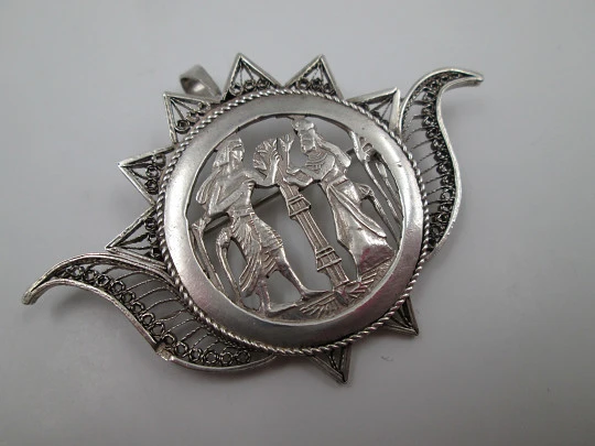 Women's openwork silver pendant brooch. Lotus flower picking scene. 1980's