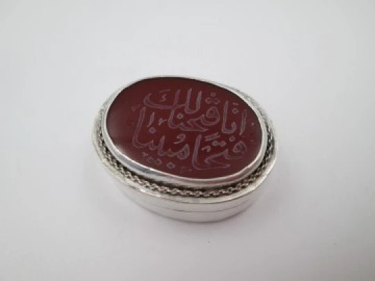 Women's oval pillbox. 925 sterling silver. Garnet stone and Arabic letters. 1980's