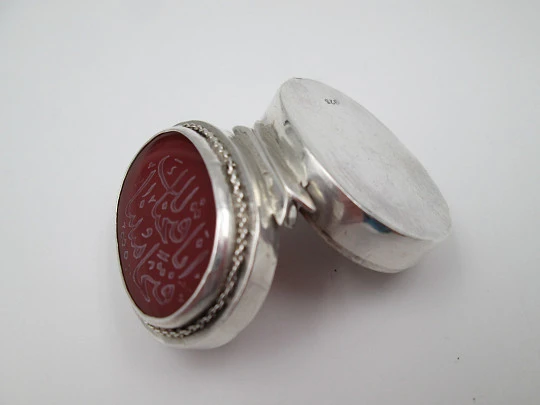 Women's oval pillbox. 925 sterling silver. Garnet stone and Arabic letters. 1980's
