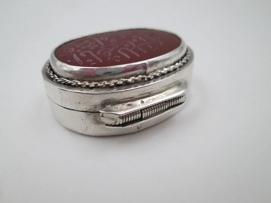 Women's oval pillbox. 925 sterling silver. Garnet stone and Arabic letters. 1980's