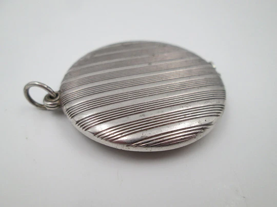 Women's pendant mirror. Sterling silver. Lines motifs. Tab clasp. 1970's